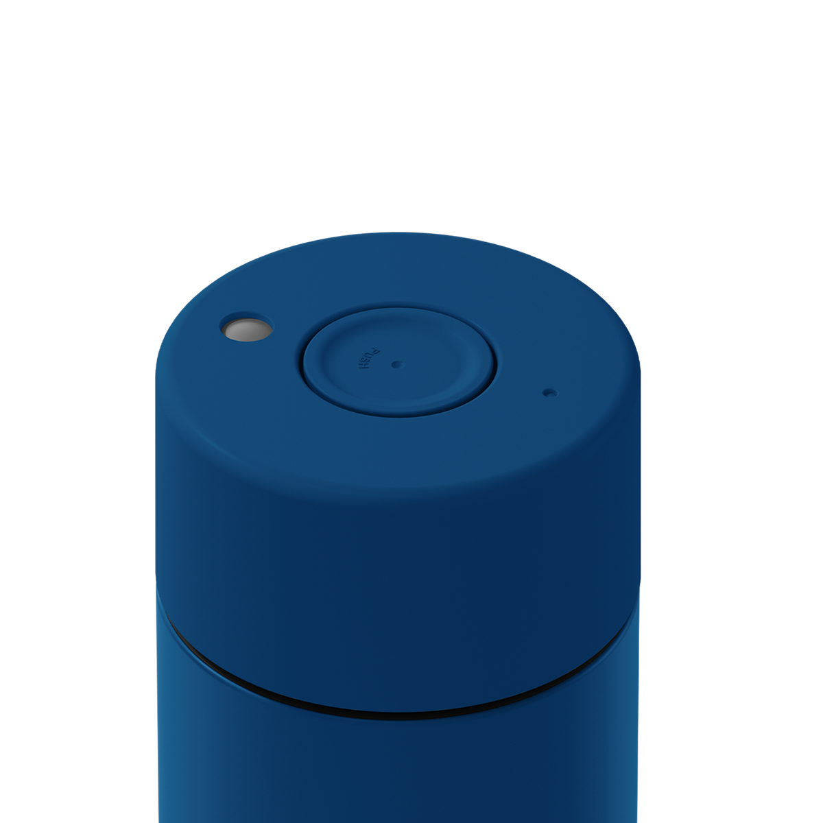 Close-up of the top of a blue cylindrical container or device with a circular button, a small light, and a small port on a white background.