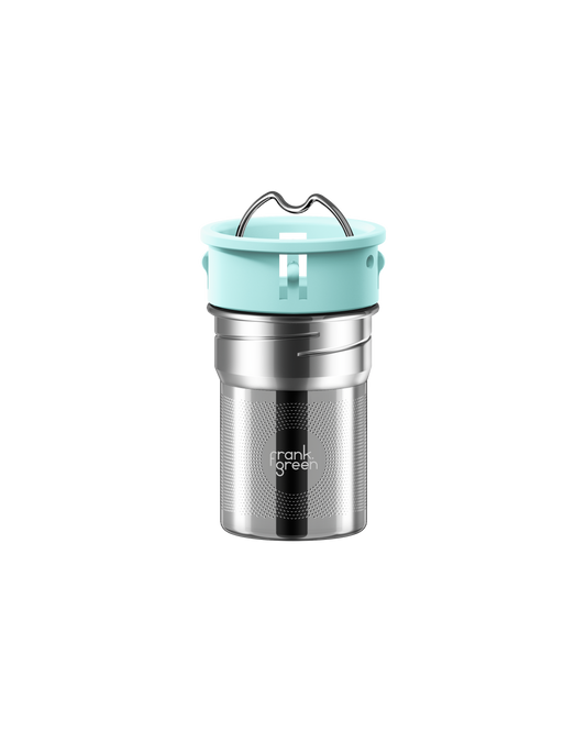All | A stainless steel travel tumbler with a mint green lid and carrying handle, featuring the 'frank grill' logo on the front, set against a solid white background.