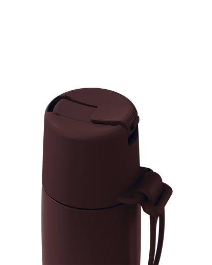 Close-up of a dark brown insulated bottle lid with a flip-top spout and carrying loop, shown on a plain white background.