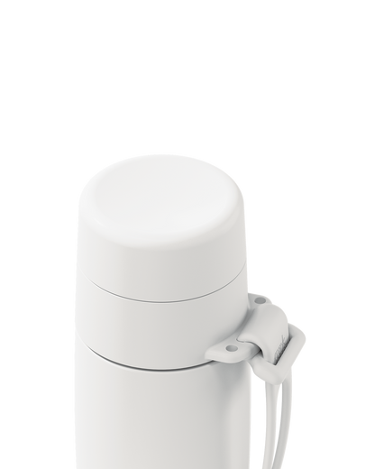 Close-up of a white thermal lid closed on a 12oz insulated bottle, with the carry loop attached.