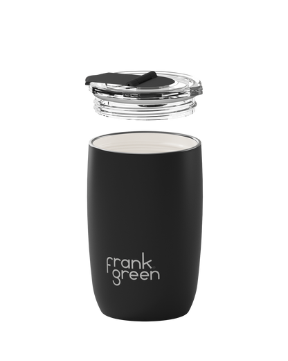 A matte black insulated tumbler with a clear lid and black straw, shown on a plain white background. The brand name 'frank green' is printed in white near the bottom.
