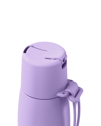Close-up of a light purple insulated bottle lid with a carrying loop, shown on a plain white background.