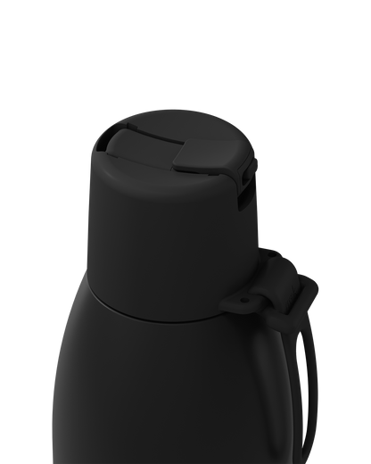 Close-up of a matte black insulated bottle with a flip-top lid and carrying loop, shown on a plain white background.